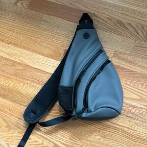 Duchamp London rubberized gray/black sling bag NWOT. Unisex for men or women